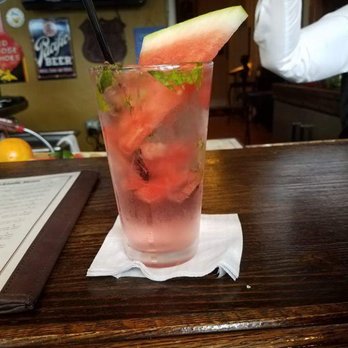 Moose & Goose Lounge - a watermelon drink on a table - Lounges Near Me - Lake Lure, North Carolina Moose & Goose Lounge - a watermelon drink on a table - Lounges Near Me - Lake Lure, North Carolina