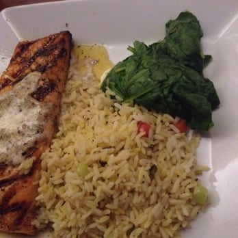 Dave & Buster's Orlando - My husband's salmon entree. That wierd green blob is supposed to be spinach. - American Near Me - Orlando, Florida