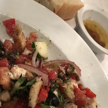 Giannfranco's Trattoria - Panzanella salad, olive oil dipping sauce and bread - Italian Near Me - Carpinteria, California Giannfranco's Trattoria - Panzanella salad, olive oil dipping sauce and bread - Italian Near Me - Carpinteria, California