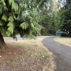 Game Farm Wilderness Park - Area to the left is the campground and the green building to the right is where the bathrooms are located. A bit of a walk.
