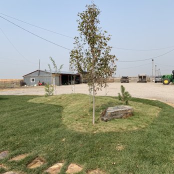 Pondside Property Services - Flagstone stepper walkway and island with accent boulders - Landscaping Near Me - Rigby, Idaho Pondside Property Services - Flagstone stepper walkway and island with accent boulders - Landscaping Near Me - Rigby, Idaho