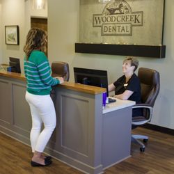 Wood Creek Dental - Welcome receptionist
