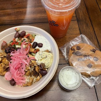 Mezeh - Keynes Dr - Chicken shawarma bowl with mango punch and a chocolate chip cookie - Mediterranean Near Me - Charlotte, North Carolina Mezeh - Keynes Dr - Chicken shawarma bowl with mango punch and a chocolate chip cookie - Mediterranean Near Me - Charlotte, North Carolina