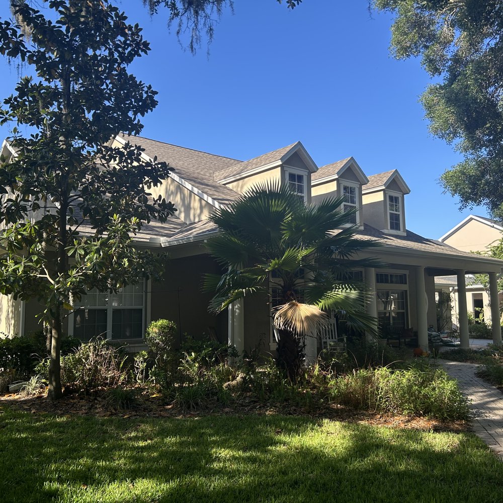 Anderson Seamless Gutters - Corner front house pic - Gutter Services Near Me