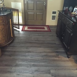 Floor Show Inc - Luxury Vinyl Plank - looks like wood and easy to clean