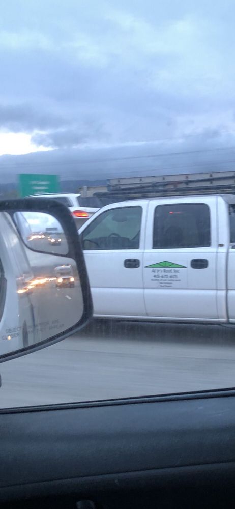 Slide of Al Jr's Roofing