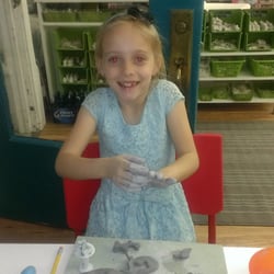 Clayful Art - Emma making clay pendants at Clayful Art