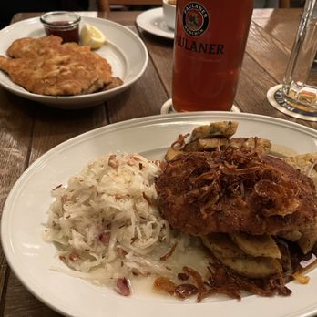 Münchner Stubn - Brewmasters schnitzel, saurkraut, Wiener schnitzel in the background - Bavarian Near Me - Munich, BY