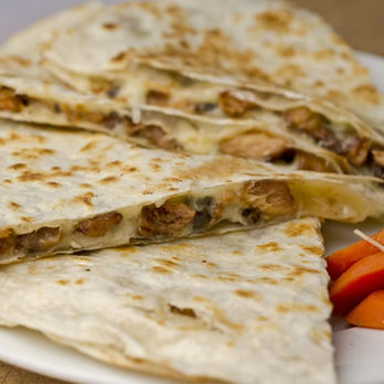 Tacos San Buena - a plate of quesadillas - Mexican Near Me - San Francisco, California Tacos San Buena - a plate of quesadillas - Mexican Near Me - San Francisco, California