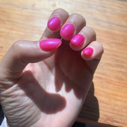 Cindy's Nail Salon - Thumb nail, chipped on the side.
