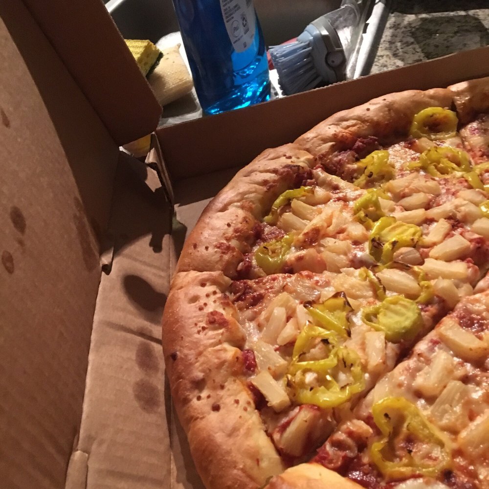 a pizza in a pizza box