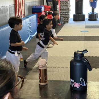Knockout Martial Arts Taekwondo - Little guy ready to take off, with a smile - Taekwondo Near Me - Rancho Cucamonga, California Knockout Martial Arts Taekwondo - Little guy ready to take off, with a smile - Taekwondo Near Me - Rancho Cucamonga, California