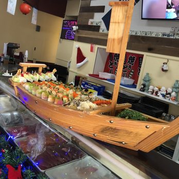 Sushi Yo - Company party next to me and they ordered the boat. Check it out! - Sushi Bars Near Me - Sacramento, California Sushi Yo - Company party next to me and they ordered the boat. Check it out! - Sushi Bars Near Me - Sacramento, California
