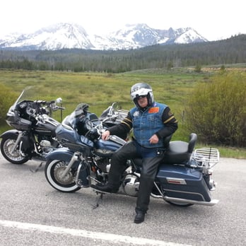 Cougar Mountain Lodge - a man sitting on a motorcycle - American Near Me - Cascade, Idaho