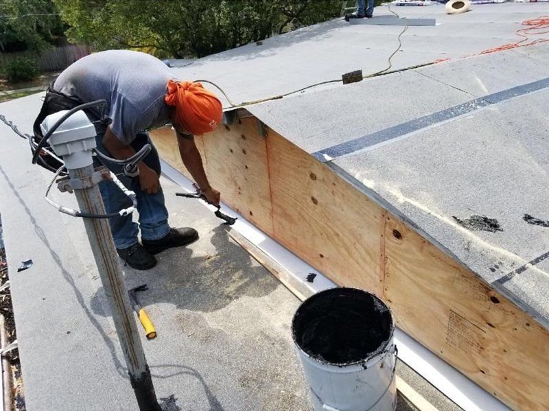 Slide of A.M. Roofing and Waterproofing