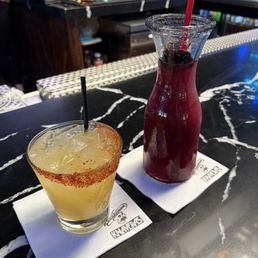Pineapple Mezcal (Left) , Chubacabra Slushee (Right) Pineapple Mezcal (Left) , Chubacabra Slushee (Right)