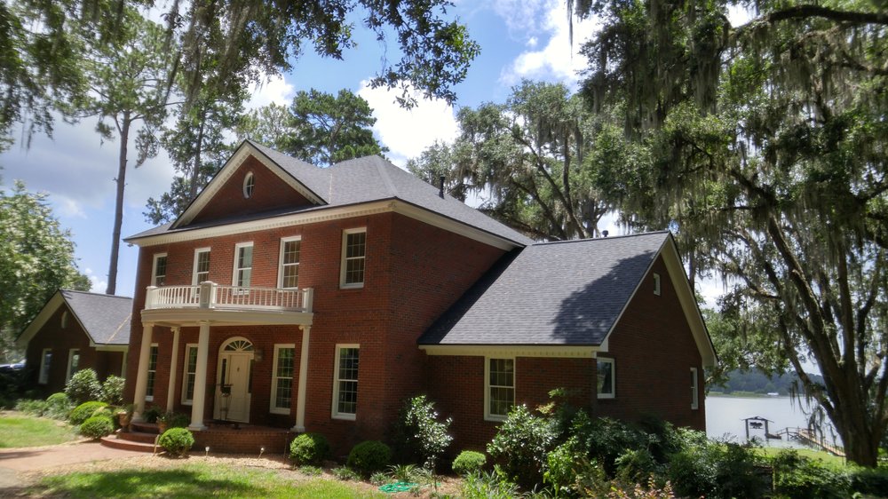 Slide of Tadlock Roofing