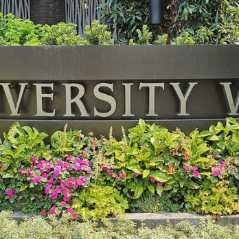 University Village - Sign with flowers - Shopping Centers Near Me - Seattle, Washington University Village - Sign with flowers - Shopping Centers Near Me - Seattle, Washington