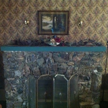 Pansy's Parlor Bed & Breakfast - Fireplace made of variety of rocks from School of Mines - Bed & Breakfast Near Me - Golden, Colorado Pansy's Parlor Bed & Breakfast - Fireplace made of variety of rocks from School of Mines - Bed & Breakfast Near Me - Golden, Colorado