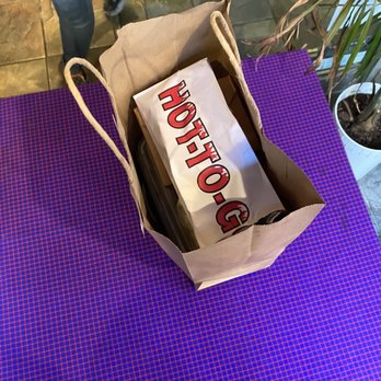 Red Bamboo - a bag of hot dogs on a purple mat - Vegetarian Near Me - New York, New York Red Bamboo - a bag of hot dogs on a purple mat - Vegetarian Near Me - New York, New York