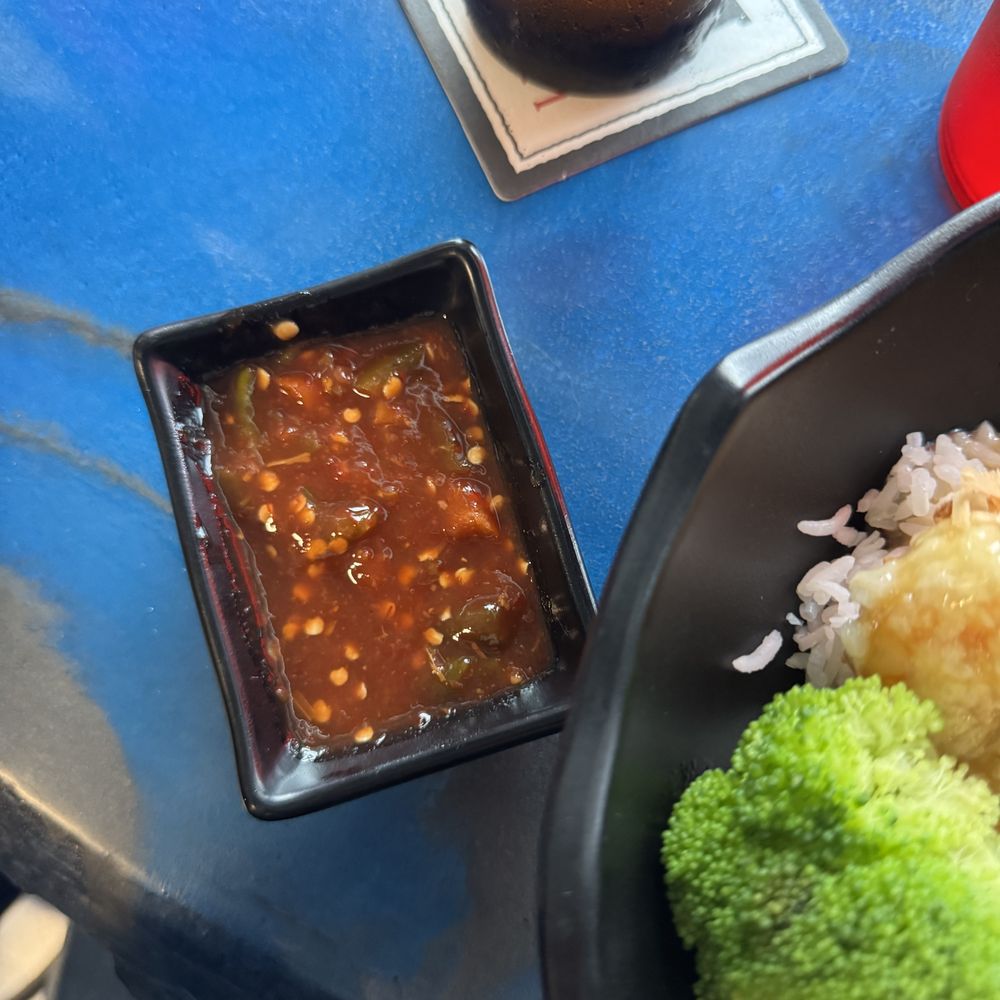 Puffy's Magic Dragon - housemade chili oil - Asian Fusion Near Me - Carolina Beach, North Carolina Puffy's Magic Dragon - housemade chili oil - Asian Fusion Near Me - Carolina Beach, North Carolina