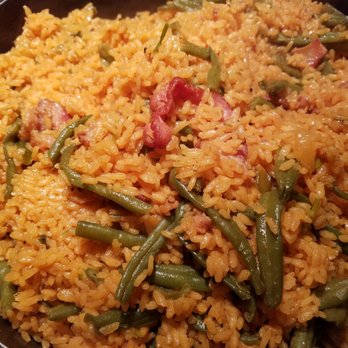 The Last Taino - a bowl of rice and green beans - Caribbean Near Me The Last Taino - a bowl of rice and green beans - Caribbean Near Me