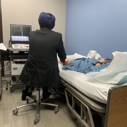 Kinisi Institute for Movement - Dr. Bedi doing the second part of the EMG.