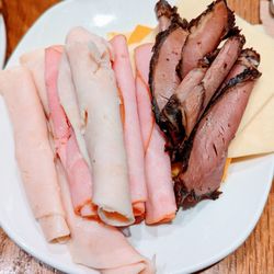 Alaska Lounge - North Satellite - Luncheon meats (ham, turkey, roast beef) + cheese