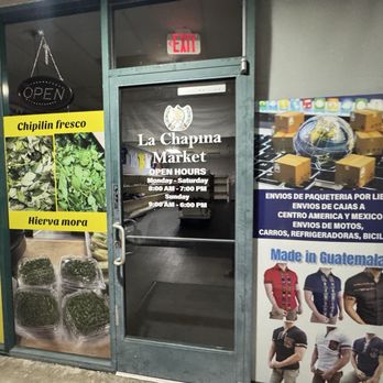 La Chapina Market - Front door with store hours - Grocery Near Me - Citrus Heights, California