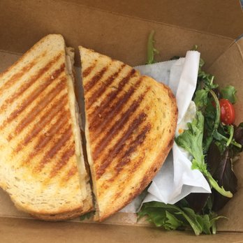 KrungThep Tea Time - What the inside of a Krungthep to-go box looks like. Bird & Apple on sourdough with a side salad. - Tea Rooms Near Me - Winter Park, Florida KrungThep Tea Time - What the inside of a Krungthep to-go box looks like. Bird & Apple on sourdough with a side salad. - Tea Rooms Near Me - Winter Park, Florida