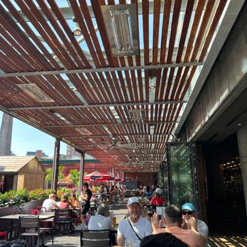 Mill Street Beer Hall - people sitting at tables - Gastropubs Near Me - Toronto, Ontario