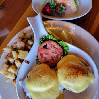 Morning Glory Brunchery - Eggs Benedict plate and a side of fruit. Eggs poached properly, sauce not over powering, fruit ripe. - Breakfast & Brunch Near Me - Mesa, Arizona