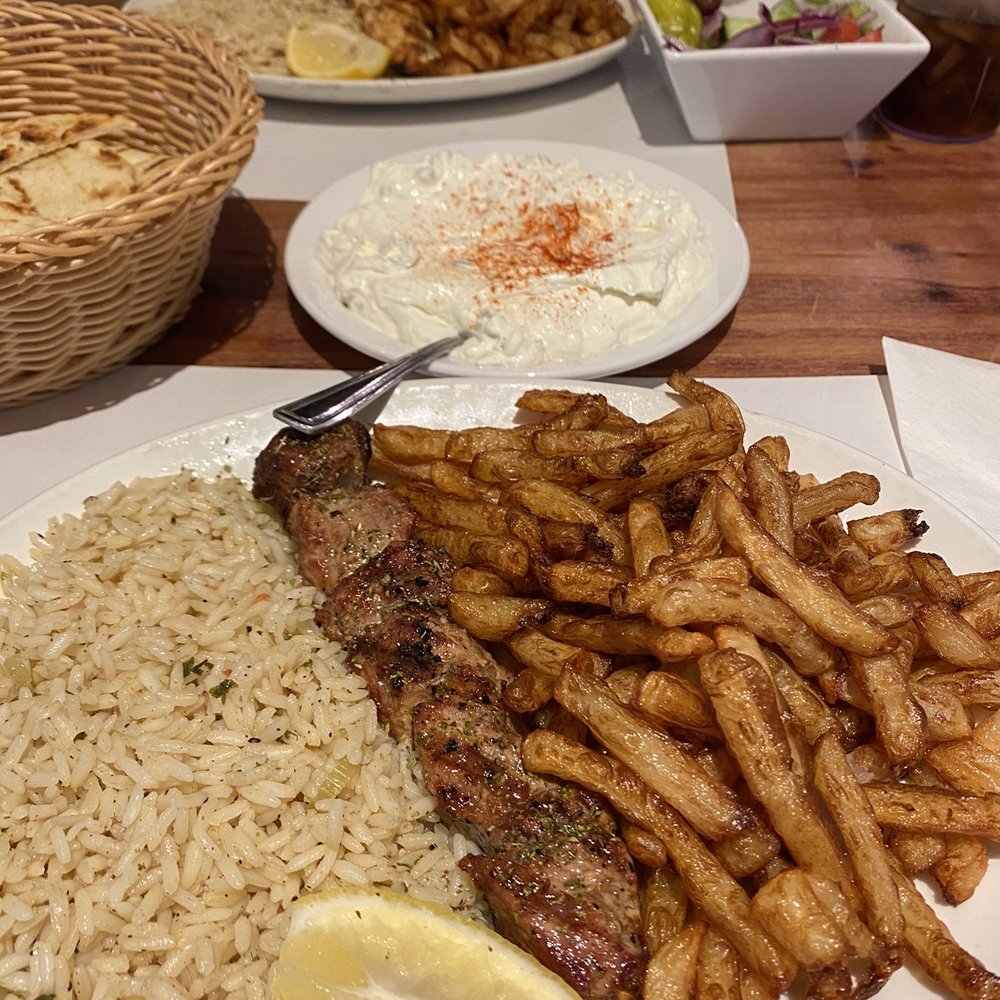 Pork souvlaki with rice and fried Pork souvlaki with rice and fried