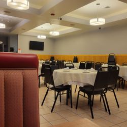 Gourmet Village - Dining room at 5pm,  Warriors game was on TV