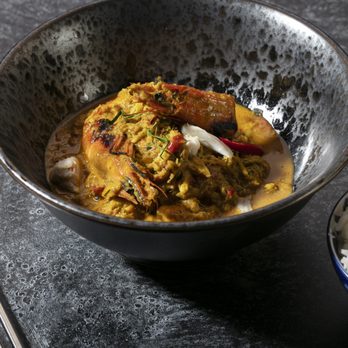 Kinn - Kinn Gaeng Garee Talay (Yellow Curry with Seafood) - Thai Near Me - New York, New York Kinn - Kinn Gaeng Garee Talay (Yellow Curry with Seafood) - Thai Near Me - New York, New York