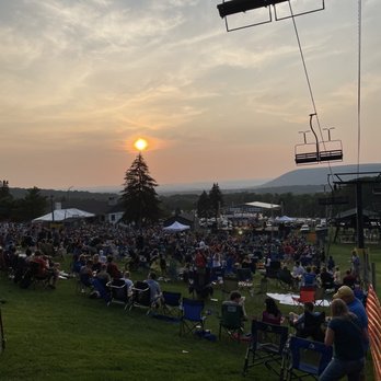 Tussey Mountain Wingfest - a crowd of people sitting in lawn chairs under a ski lift - Street Vendors Near Me - Boalsburg, Pennsylvania Tussey Mountain Wingfest - a crowd of people sitting in lawn chairs under a ski lift - Street Vendors Near Me - Boalsburg, Pennsylvania