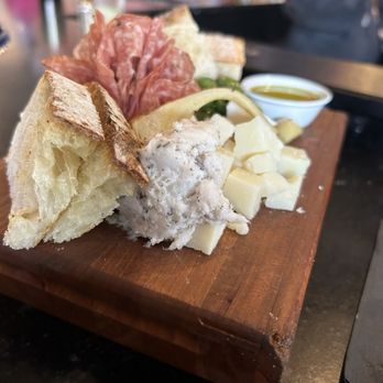 M’tucci’s Bar Roma - House Bread with Basil Oil and salami and cheese - Cocktail Bars Near Me - Albuquerque, New Mexico