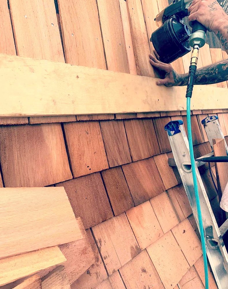 Slide of Lummus Park Roofing