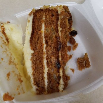 MP Island Cafe - A piece of carrot that was sold to me. I'm sure it was molded at the bottom!!! Why else cut a cake off like this? It went in the trash!!! - Soul Food Near Me - Norfolk, Virginia MP Island Cafe - A piece of carrot that was sold to me. I'm sure it was molded at the bottom!!! Why else cut a cake off like this? It went in the trash!!! - Soul Food Near Me - Norfolk, Virginia