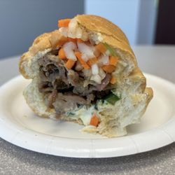 Saigon Bistro - The grilled pork sandwich (banh mi thi nuong - $8) was juicy with fresh and finely chopped daikon vegetables.