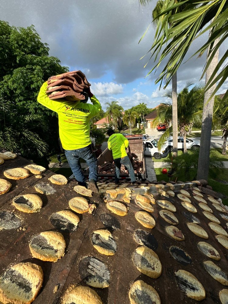 Slide of Phoenix Roofing Group