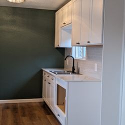 Humboldt Renovation And Design - Complete ADU Renovation including new foundation, LVT flooring, white shaker cabinets, subway tile backsplash, bathroom w walk in shower.