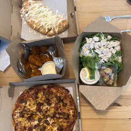 Gluten free pepperoni, sausage and cheddar cheese Boneless wings Large Caesar salad with chicken The garlic pesto hearth bread Gluten free pepperoni, sausage and cheddar cheese Boneless wings Large Caesar salad with chicken The garlic pesto hearth bread
