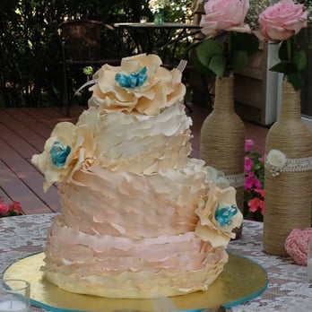 The Artful Baker - a wedding cake on a table - Bakeries Near Me The Artful Baker - a wedding cake on a table - Bakeries Near Me