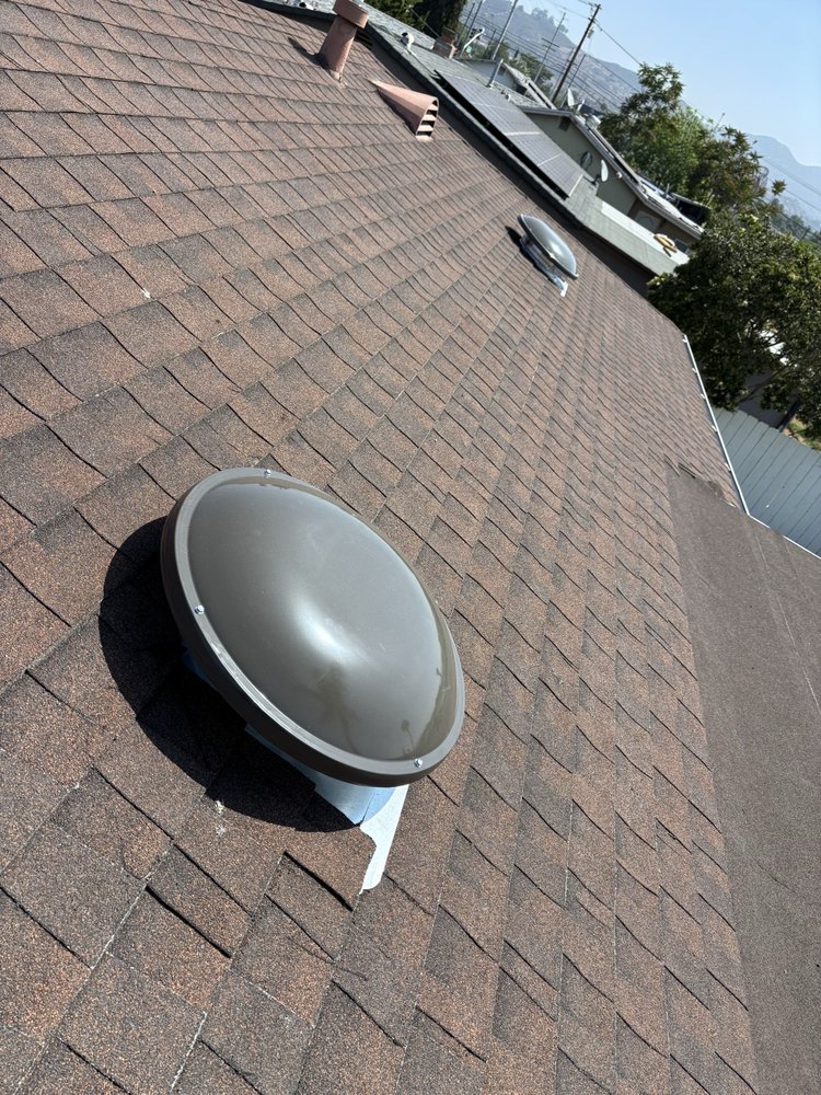 Slide of Vigil's Roofing