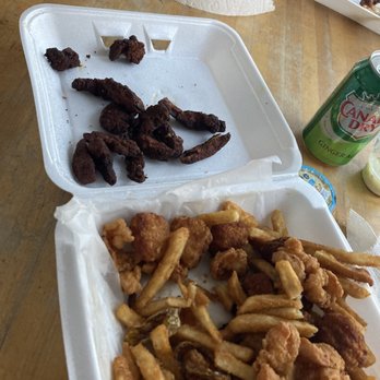 Filippou's Twisted Pizza - Completely burnt clam strips. - Pizza Near Me - Coventry, Rhode Island Filippou's Twisted Pizza - Completely burnt clam strips. - Pizza Near Me - Coventry, Rhode Island