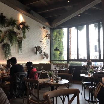 Yardbird - Light and airy but closely packed tables. Photo taken at 6pm on opening night. Every table was taken by 7pm! - Southern Near Me - Los Angeles, California Yardbird - Light and airy but closely packed tables. Photo taken at 6pm on opening night. Every table was taken by 7pm! - Southern Near Me - Los Angeles, California