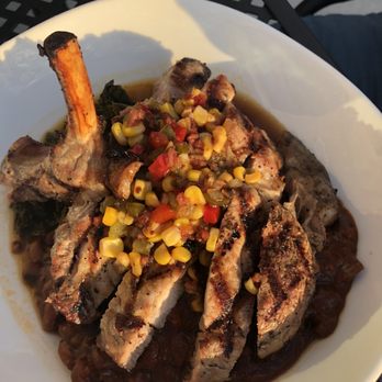 Root & Bone Indianapolis - Bone in pork chop. So good! - American Near Me - Indianapolis, Indiana