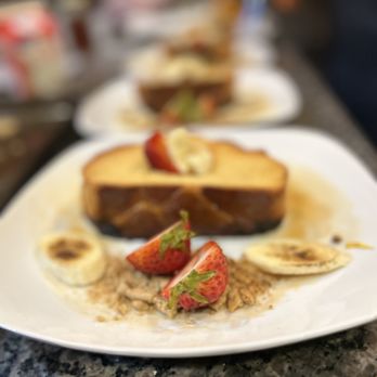 Copper State Kitchen - a plate of toast with strawberries and bananas - Personal Chefs Near Me