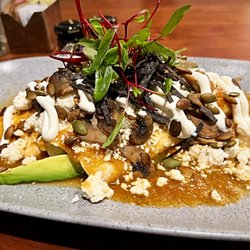 Hacienda Buffet - Guess what! They have more than a buffet. Here is the veggie enchilada. Amazing dish. Love the verde sauce and crunch from the pepitas.